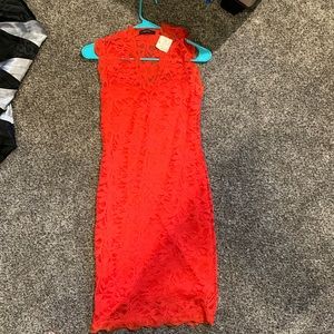 Lace knee length coral colored dress
